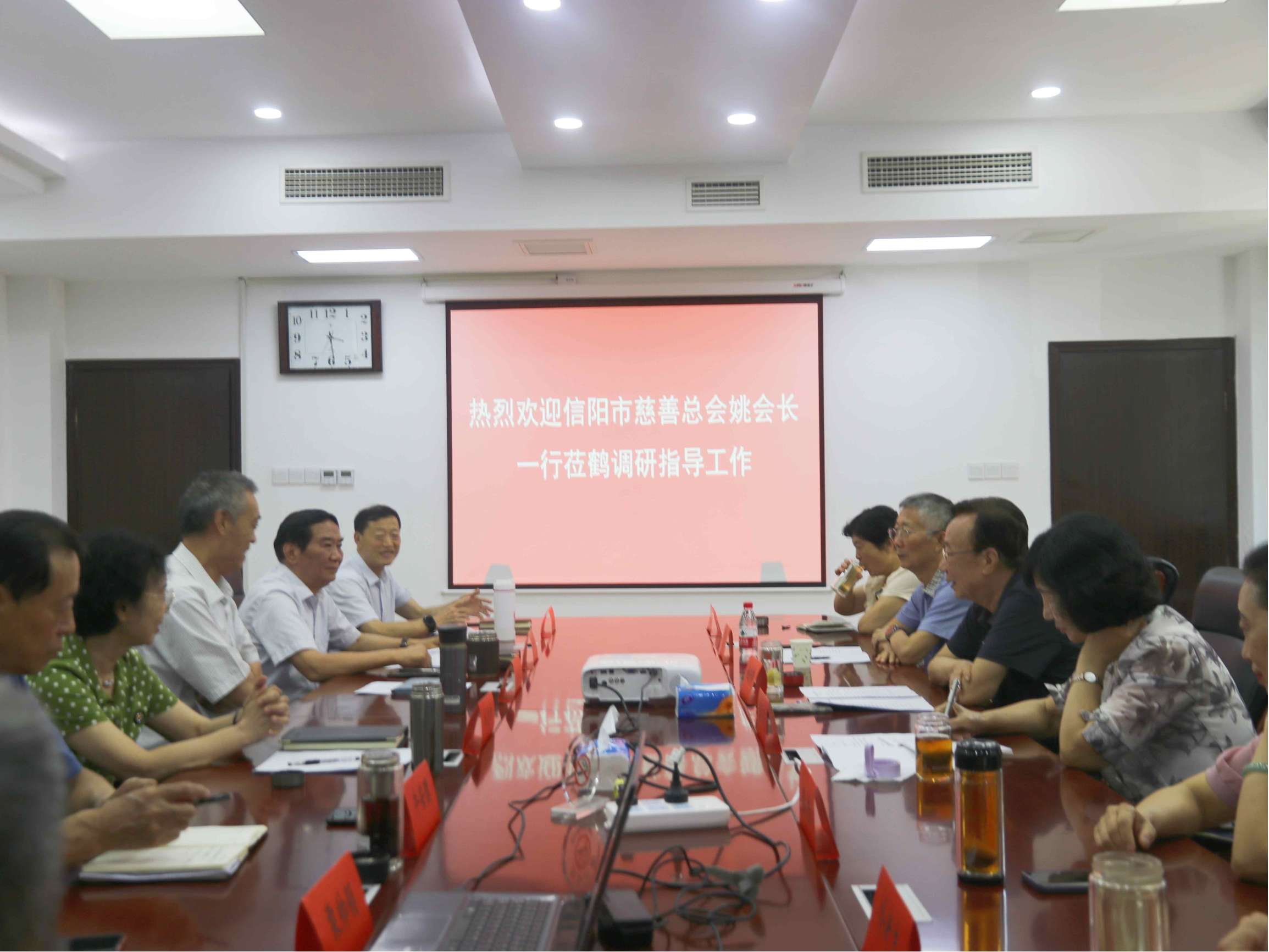 信阳市慈善总会莅鹤考察交流慈善工作